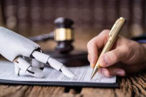 Robot hand and human hand signing in front of a gavel.